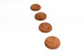 Brown chocolate chip cookies with soft tasty filling inside on a white background