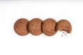 Brown chocolate chip cookies with soft tasty filling inside on a white background