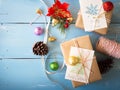 Brown christmas gift boxes with card in top view. Royalty Free Stock Photo