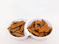 Brown cinnamon sticks spice dalchini darchini dried inner bark strips flavoring food ingredient closeup view image stock photo Royalty Free Stock Photo