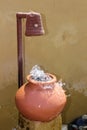 Brown clay earthen pot small decorative fountain Royalty Free Stock Photo