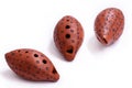 Brown clay Ocarina on a white background