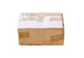 Brown closed cardboard box with transparent packing tape isolated on white background , clipping path Royalty Free Stock Photo