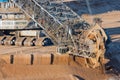 Brown coal open pit landscape with digging excavators in Germany