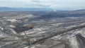 Brown coal opencast mine bucket wheel excavator giant Vrsany, aerial video shot view, open pit lignite heavy quarry Royalty Free Stock Photo