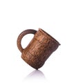 Brown coffee cup made from palm wood. Studio shot isolated on white Royalty Free Stock Photo