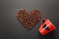 Brown coffee solated on black texture background for design. Saint Valentine`s Day card on fabruary 14, holiday concept. Royalty Free Stock Photo