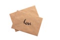 Brown color envelope with hand writing word love