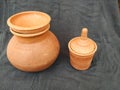 Brown Color hand Made Empty Pot, Bowl and Glass with Lid isolated on a Black Background Royalty Free Stock Photo