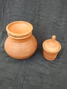 Brown Color hand Made Empty Pot, Bowl and Glass with Lid isolated on a Black Background Royalty Free Stock Photo