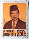 postage stamp printed in Indonesia with portrait image of Suharto the Indonesian second president, circa 1982