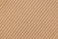 Brown corrugated cardboard background arranged diagonally
