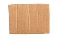 Brown corrugated cardboard torn piece  on white background Royalty Free Stock Photo