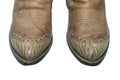 Brown cowboy boots isolated on a white background. Royalty Free Stock Photo