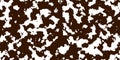 Brown cowhide with white spots as a seamless pattern Royalty Free Stock Photo