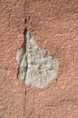 Brown crack and fallen off plaster on wall Royalty Free Stock Photo