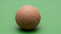 Between the earthy brown of the sphere and the vibrant green Royalty Free Stock Photo