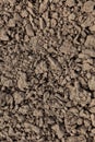 Brown Cracked ground,Cray Soil,Mud Crack.Cracks on the surface of the earth are altered by the shrinkage of mud due to Royalty Free Stock Photo