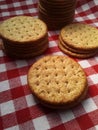 Brown crackers on a red and white checkered background