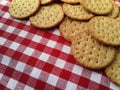 Brown crackers on a red and white checkered background