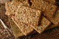 Brown crackers topped with seeds