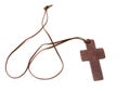 Brown crucifix isolated on white background Royalty Free Stock Photo