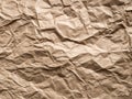 Brown crumpled craft paper background. Old texture eco waste recycling concept Royalty Free Stock Photo