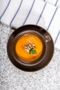 Brown cup with squash soup Royalty Free Stock Photo