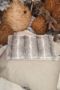 Brown cushion and animal skin with a warm Christmas decoration