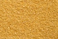 Brown demerara sugar, coarse crystalline sugar, background, from above