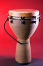 Brown Djembe Isolated On Red Royalty Free Stock Photo