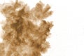 Brown dust cloud.Brown particles splattered on white background Royalty Free Stock Photo