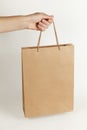Brown ecological paper bag on white background. Store packaging Royalty Free Stock Photo