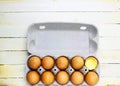 Brown eggs in a cardboard box. Fresh organic chicken eggs in carton or egg container with copy space Close-up view of Royalty Free Stock Photo