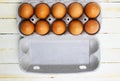 Brown eggs in a cardboard box. Fresh organic chicken eggs in carton or egg container with copy space Close-up view of Royalty Free Stock Photo