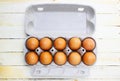 Brown eggs in a cardboard box. Fresh organic chicken eggs in carton or egg container with copy space Close-up view of Royalty Free Stock Photo