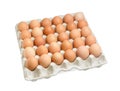 Brown eggs in the cardboard egg tray on light background Royalty Free Stock Photo