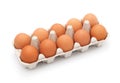 Brown eggs in egg box on white background Royalty Free Stock Photo