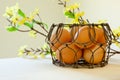Brown eggs in a wire basket Royalty Free Stock Photo