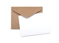 Brown envelope with a blank white card Royalty Free Stock Photo