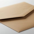 A brown envelope made of plain paper rests on a white surface. The envelope is Royalty Free Stock Photo