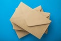 Brown envelopes on blue background