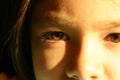 Brown eyes of eight year old girl