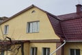 Brown facade of a concrete private house with windows Royalty Free Stock Photo