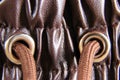 Brown faux leather elasticated waist drawstring jogger trousers close-up
