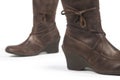 Brown female leather boots isolated on white Royalty Free Stock Photo