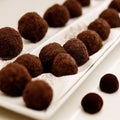 Brown filled cocoa powder truffles, pralines, dessert, confectionery, food, cooking - AI generated, generative AI
