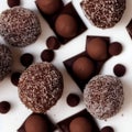 Brown filled dark chocolate and cocoa powder truffles, praline, dessert, confectionery, cooking, food - AI generated art