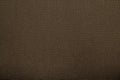 Brown fishnet cloth material as a texture background. Royalty Free Stock Photo