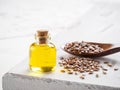 Brown flax seeds and flaxseed oil close up Royalty Free Stock Photo